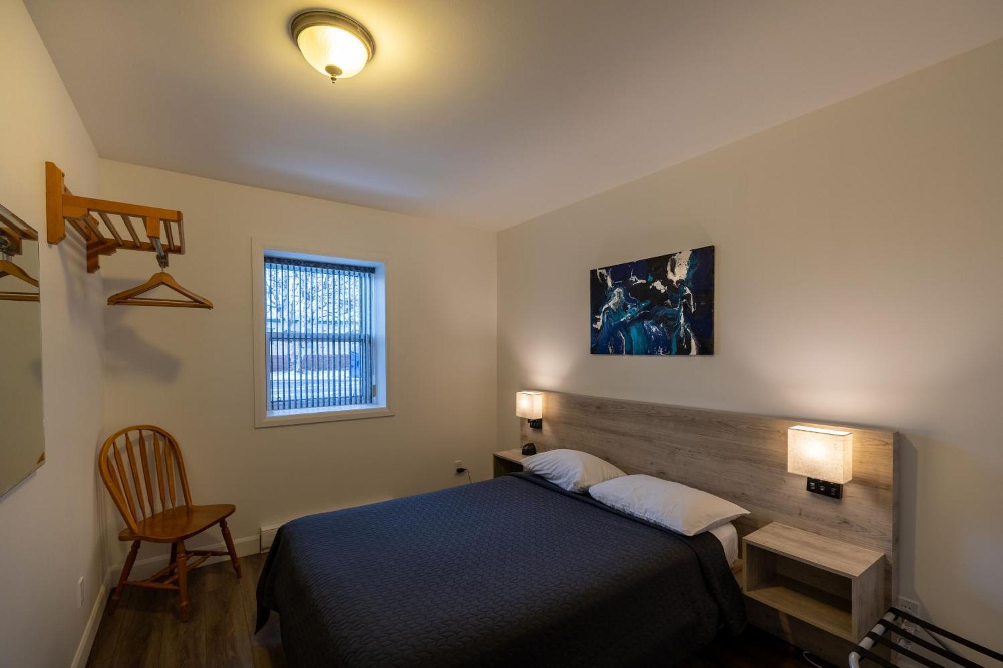 Motel Et Condo Chez Charley Sainte-Anne-de-Beaupré Екстериор снимка